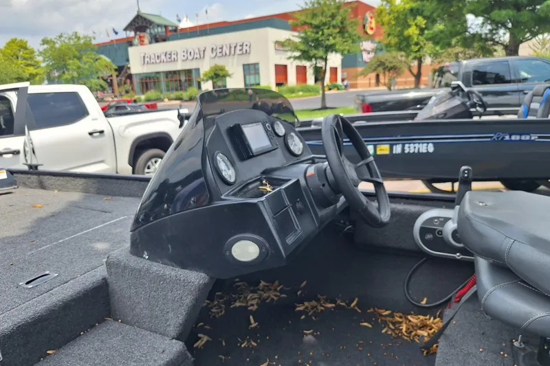 Slide: The Image of 2023 Lowe Skorpion 17 boat interior at Tracker Boat Center parking lot. - 11