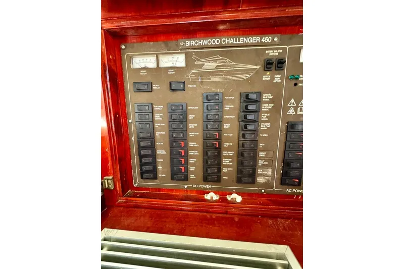 Slide: The Image of Control panel of a 1999 Birchwood Challenger 450 Flybridge boat. - 17