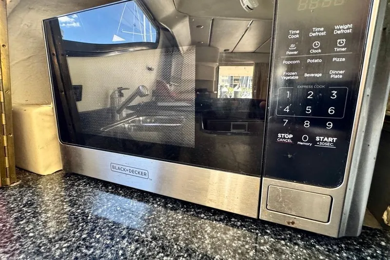 Slide: The Image of Black+Decker microwave on Birchwood Challenger 450 Flybridge yacht, 1999 model. - 26