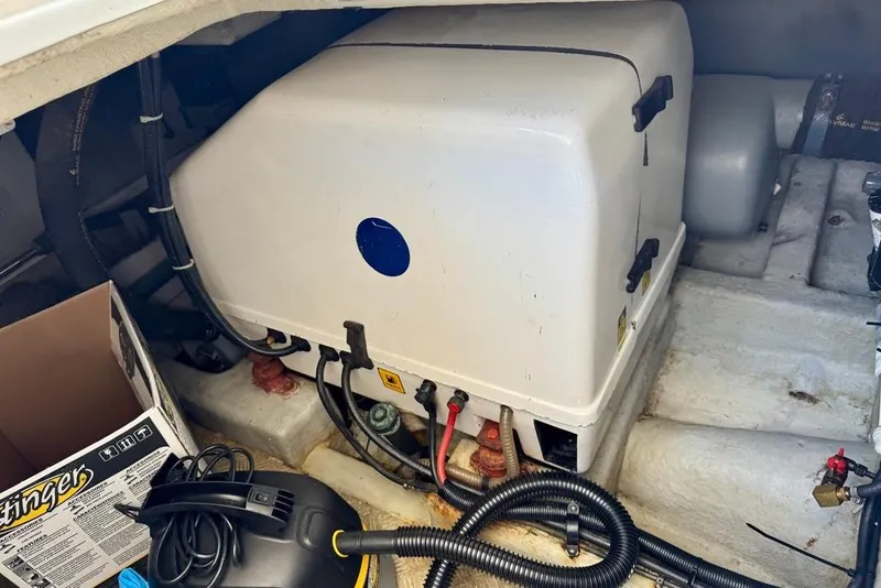 Slide: The Image of Engine compartment of a 1999 Birchwood Challenger 450 Flybridge boat. - 47