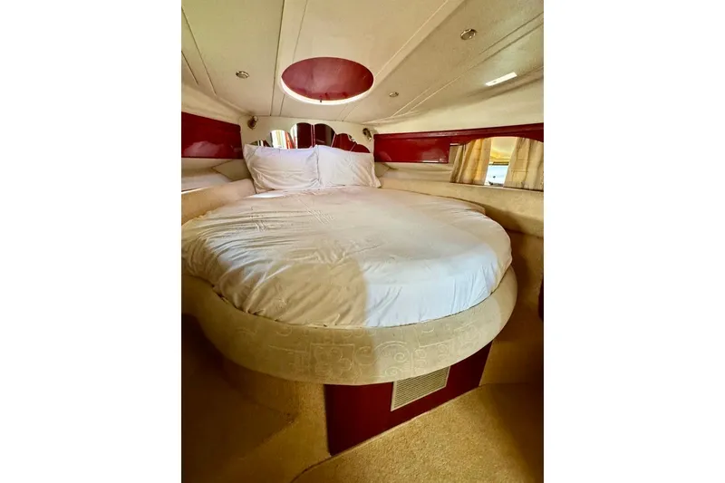Slide: The Image of Luxurious bedroom interior of 1999 Birchwood Challenger 450 Flybridge yacht. - 33