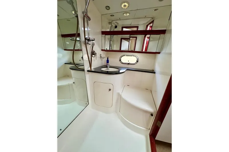 Slide: The Image of Luxurious bathroom in 1999 Birchwood Challenger 450 Flybridge yacht with modern fixtures. - 40