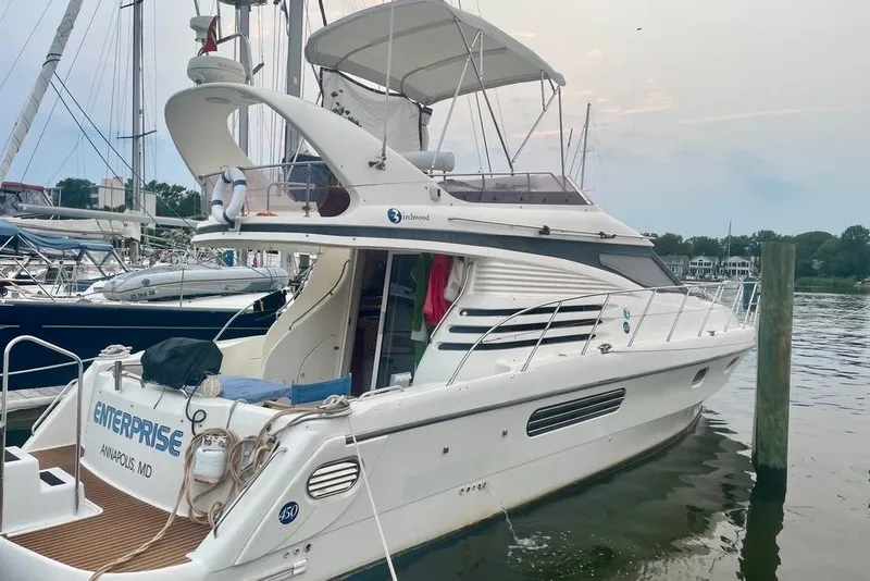 The Image of 1999 Birchwood Challenger 450 Flybridge yacht docked in Annapolis marina. - 0