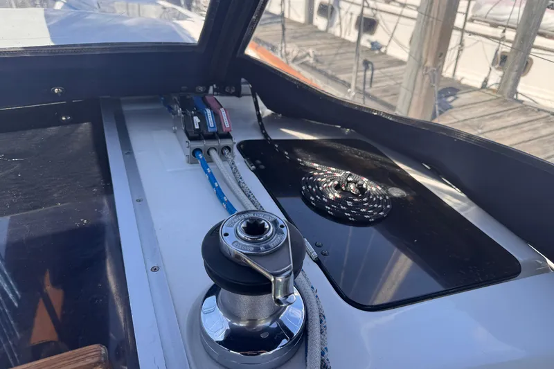 Slide: The Image of Cockpit view of a 1993 Hunter 33.5 sailboat with winch and ropes. - 10