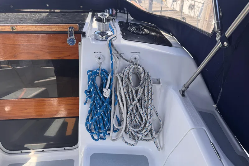 Slide: The Image of Deck of 1993 Hunter 33.5 sailboat with ropes and winch. - 20