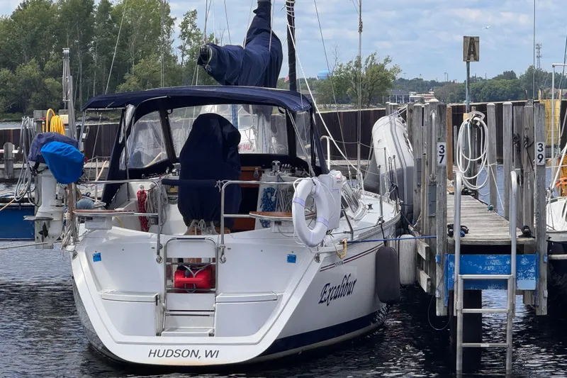 Slide: The Image of Sailboat docked at marina, Hunter 33.5 model, 1993, Hudson, WI. - 2