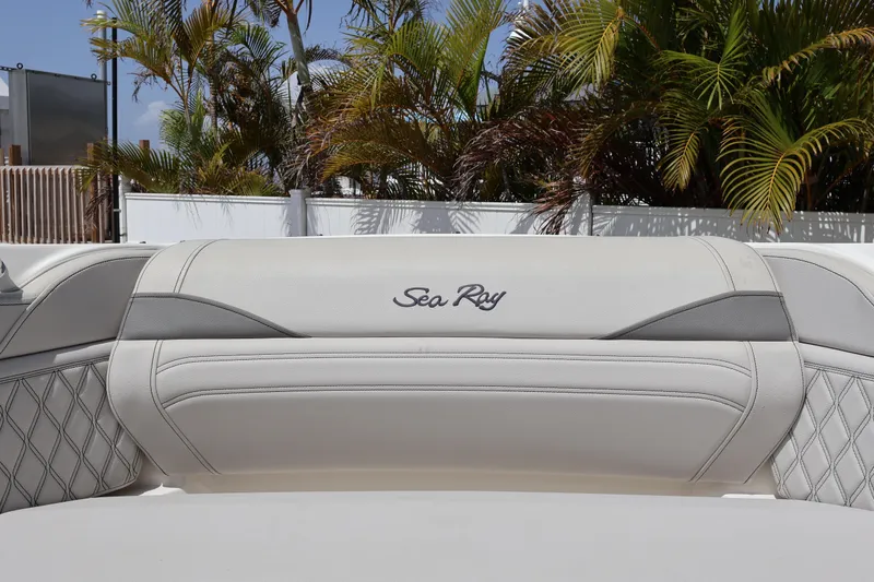 Slide: The Image of 2024 Sea Ray SLX 260 Outboard boat interior with luxurious seating and elegant design. - 16