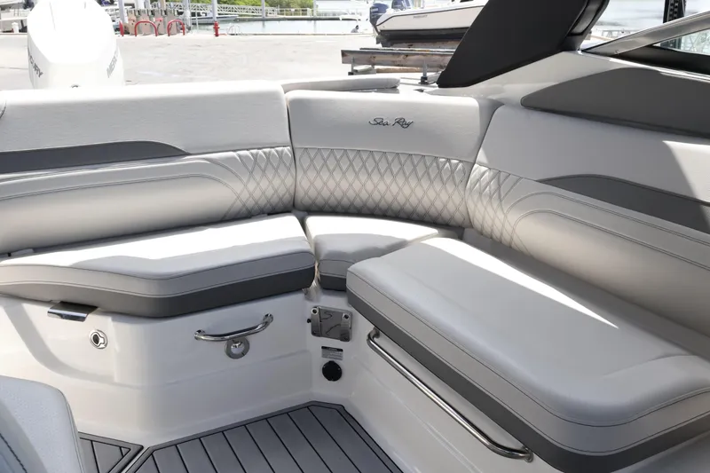 Slide: The Image of 2024 Sea Ray SLX 260 Outboard interior with luxurious seating and elegant design. - 37