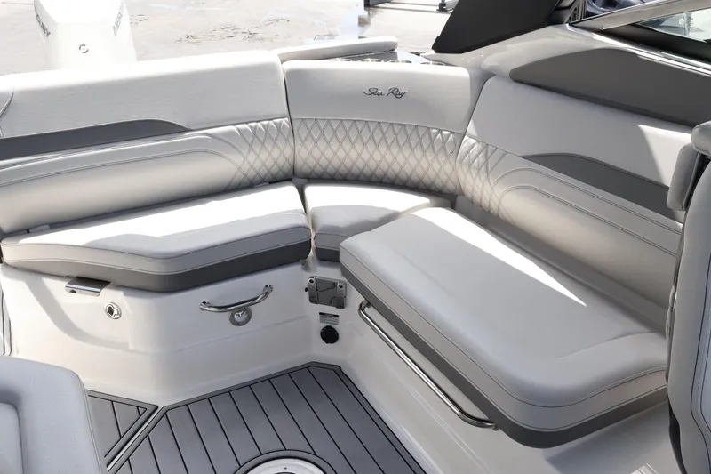 Slide: The Image of Luxurious seating on 2024 Sea Ray SLX 260 Outboard boat, featuring elegant upholstery and design. - 34