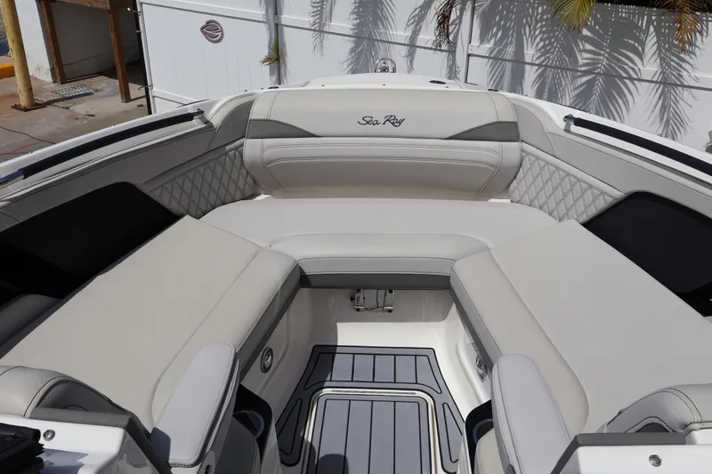 Slide: The Image of 2024 Sea Ray SLX 260 Outboard boat interior with luxurious seating and modern design. - 19