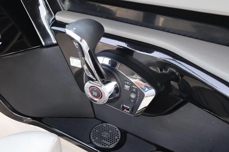 Slide: The Image of 2024 Sea Ray SLX 260 Outboard throttle control, featuring sleek design and modern functionality. - 25