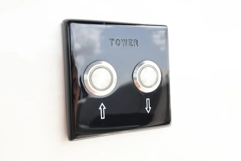 Slide: The Image of Control panel for tower adjustment on 2024 Sea Ray SLX 260 Outboard boat. - 38