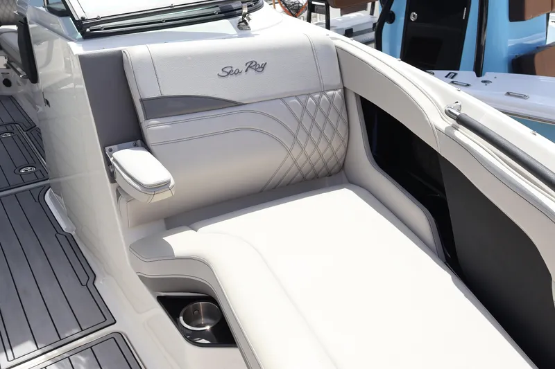 Slide: The Image of Luxurious seating on 2024 Sea Ray SLX 260 Outboard boat, featuring elegant upholstery and design. - 18
