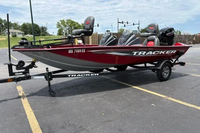 Slide: The Image of 2025 Tracker Off Road Pro Team 175 boat on trailer in parking lot. - 5