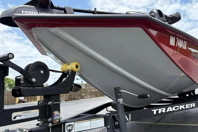 Slide: The Image of 2025 Tracker Off Road Pro Team 175 boat on trailer, showcasing hull and winch system. - 37