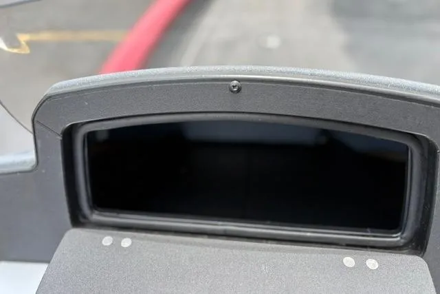 Slide: The Image of 2025 Tracker Off Road Pro Team 175 dashboard close-up, featuring a storage compartment. - 22