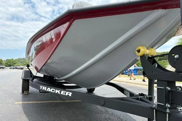 Slide: The Image of 2025 Tracker Off Road Pro Team 175 boat on trailer, showcasing sleek design and red accents. - 38