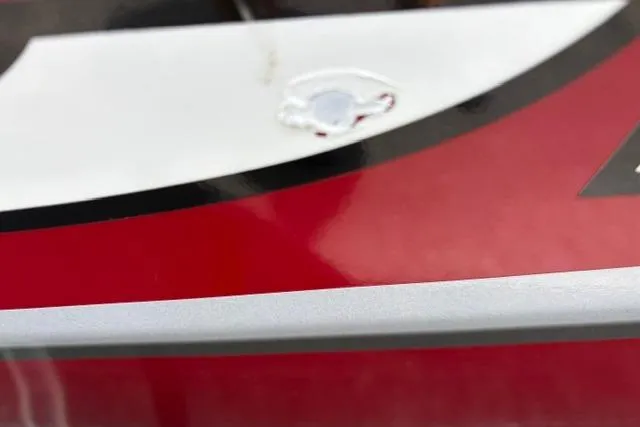 Slide: The Image of 2025 Tracker Off Road Pro Team 175, close-up of red and white exterior design. - 43