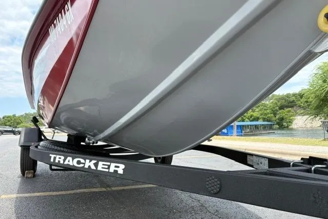 Slide: The Image of 2025 Tracker Off Road Pro Team 175 boat on trailer, parked outdoors. - 39