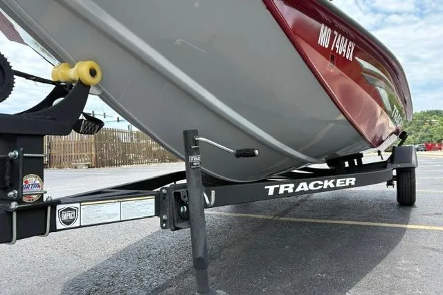 Slide: The Image of 2025 Tracker Off Road Pro Team 175 boat on trailer, parked in a lot. - 40