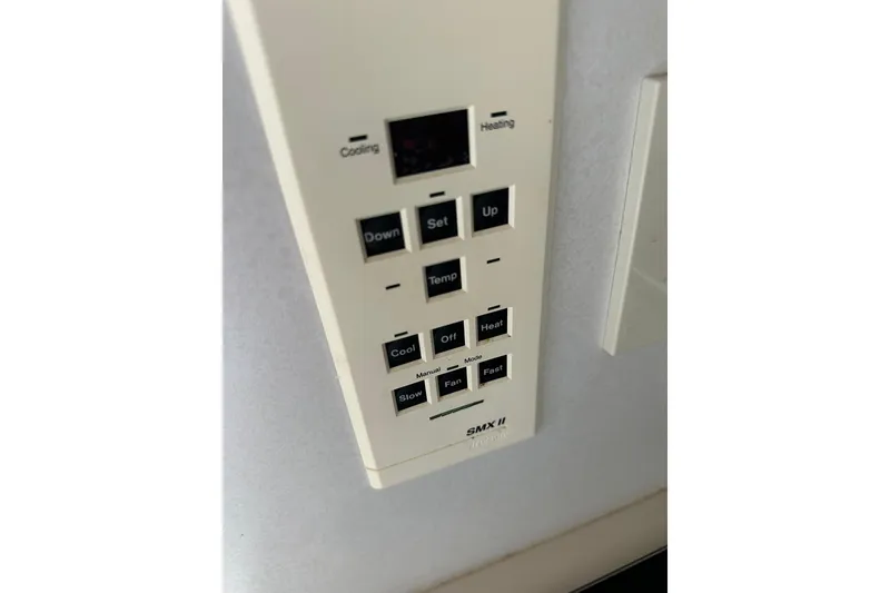 Slide: The Image of Thermostat control panel on a 1995 Cruisers Yachts 3575 Esprit boat. - 36