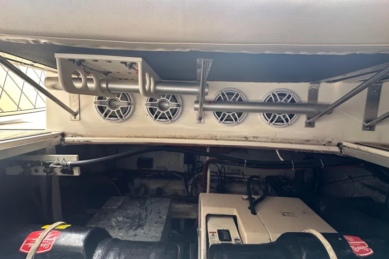 Slide: The Image of Engine compartment of 1995 Cruisers Yachts 3575 Esprit with speakers and wiring. - 37