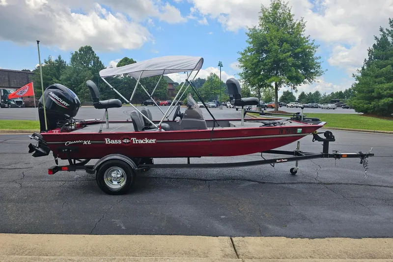 Slide: The Image of 2020 Tracker Bass Tracker Classic XL boat on trailer, parked outdoors. - 5