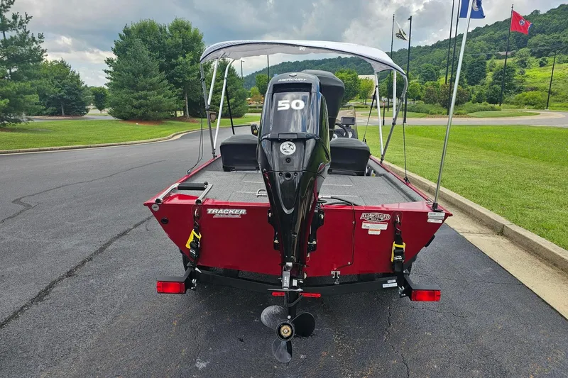 Slide: The Image of 2020 Tracker Bass Tracker Classic XL boat with Mercury 50 engine, parked outdoors. - 3