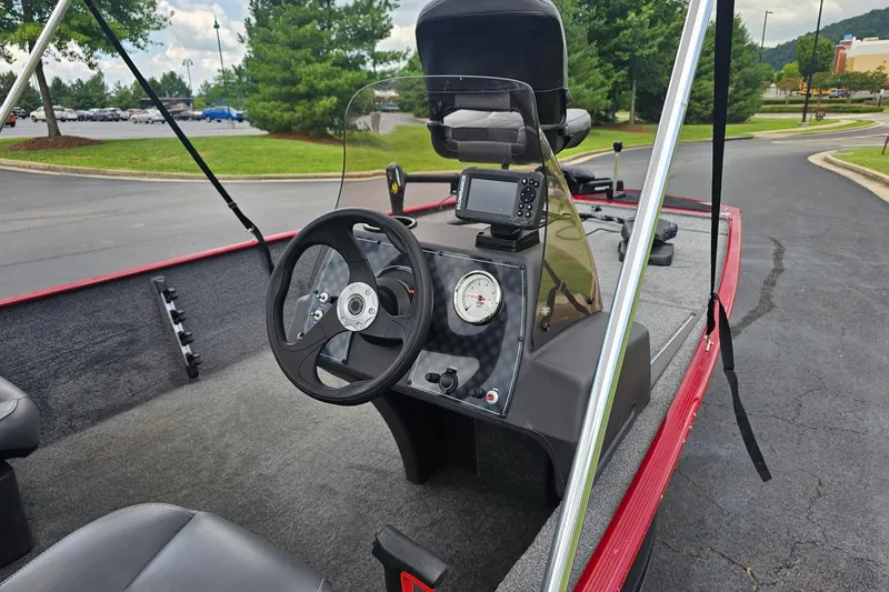 Slide: The Image of 2020 Tracker Bass Tracker Classic XL boat interior with steering wheel and dashboard. - 7