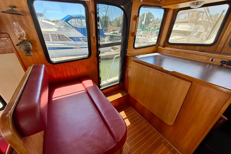 Slide: The Image of Port side of helm area with table fold down table - 40