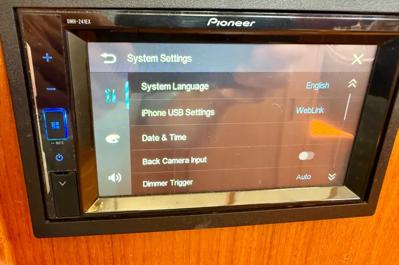 Slide: The Image of Pioneer system settings screen on a 2000 Nordic Tug 37 boat. - 70
