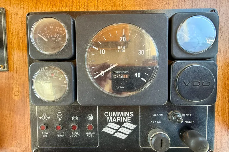Slide: The Image of Control panel of a 2000 Nordic Tug 37 with Cummins Marine gauges. - 33