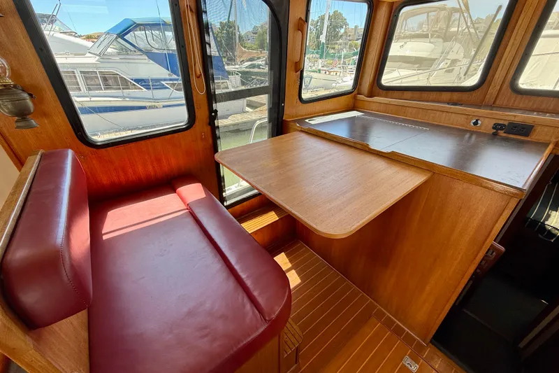 Slide: The Image of Port side of helm area with table fold down table up - 41