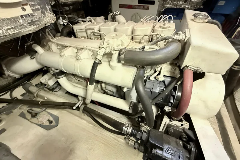 Slide: The Image of Engine of a 2000 Nordic Tug 37 boat, showcasing mechanical components. - 85