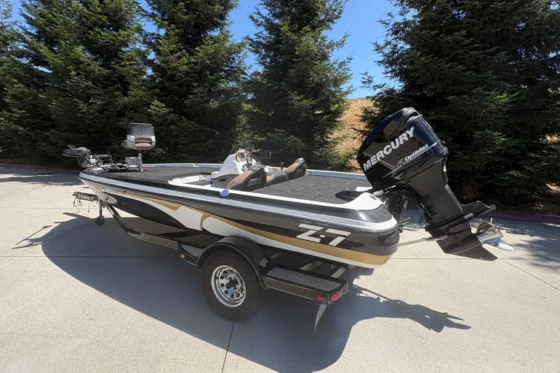 Slide: The Image of 2008 Nitro Z-7 boat with Mercury OptiMax engine, parked outdoors. - 7