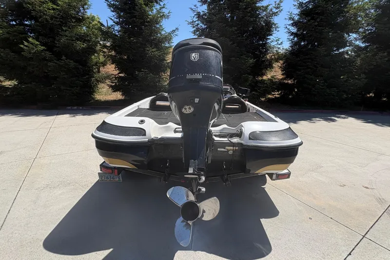 Slide: The Image of Rear view of a 2008 Nitro Z-7 boat with an outboard motor. - 4