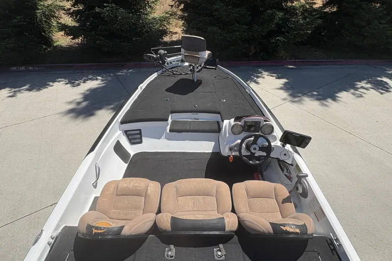 Slide: The Image of 2008 Nitro Z-7 boat interior with steering wheel, seats, and control panel. - 10