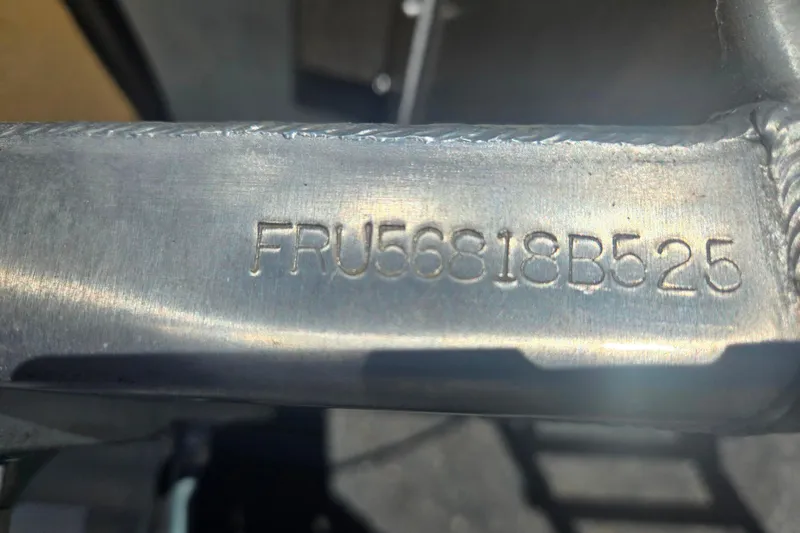 Slide: The Image of Close-up of BERSHIRE SE 16 (2025) serial number FRU56818B525 on metal surface. - 7