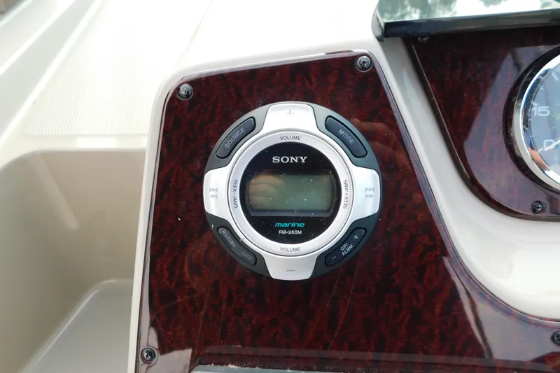 Slide: The Image of Sony marine audio system on 2010 Sea Ray Sundancer 260 dashboard. - 25