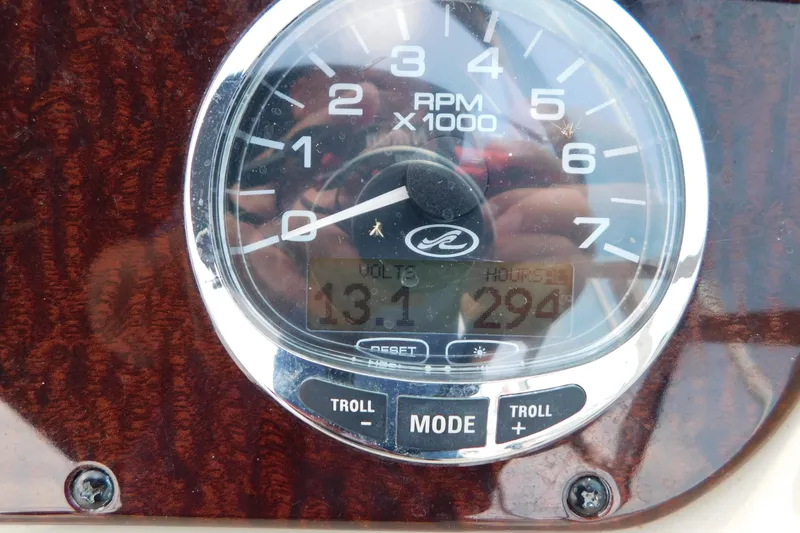Slide: The Image of Close-up of Sea Ray Sundancer 260 tachometer showing 294 hours and 13.1 volts. - 22