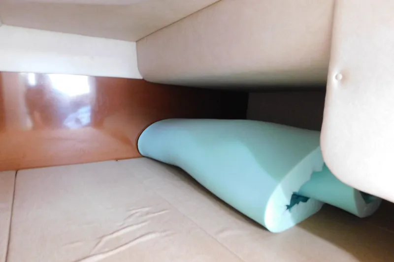 Slide: The Image of Interior cabin view of 2010 Sea Ray Sundancer 260 with foam cushion. - 46