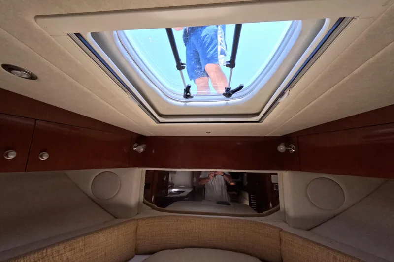 Slide: The Image of Interior view of 2008 Sea Ray Sundancer 350 cabin with skylight. - 17