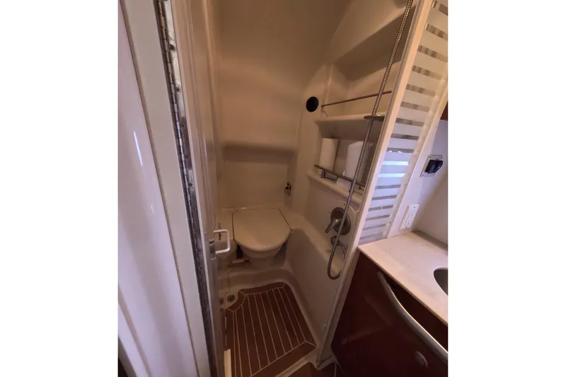 Slide: The Image of Compact bathroom in 2008 Sea Ray Sundancer 350 yacht with shower and toilet. - 25