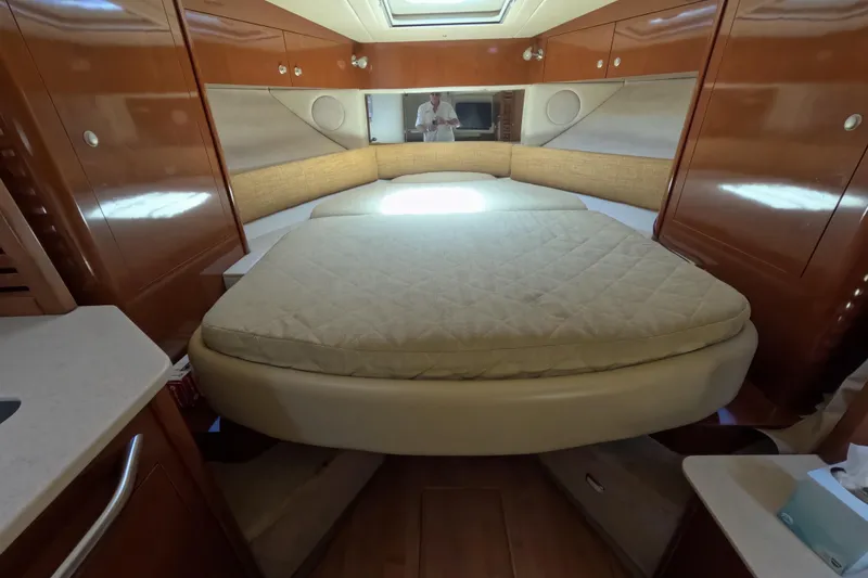 Slide: The Image of Luxurious cabin interior of 2008 Sea Ray Sundancer 350 yacht with cozy bed. - 3