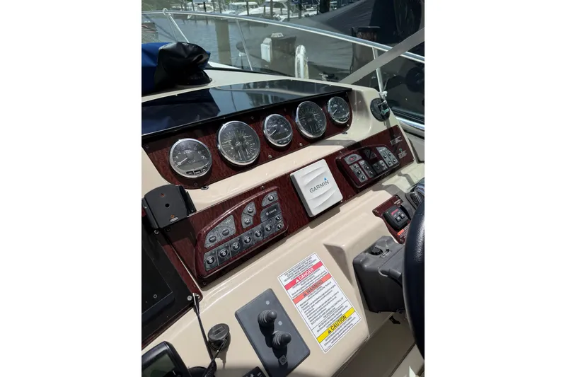 Slide: The Image of Dashboard of a 2008 Sea Ray Sundancer 350 with Garmin navigation system. - 32