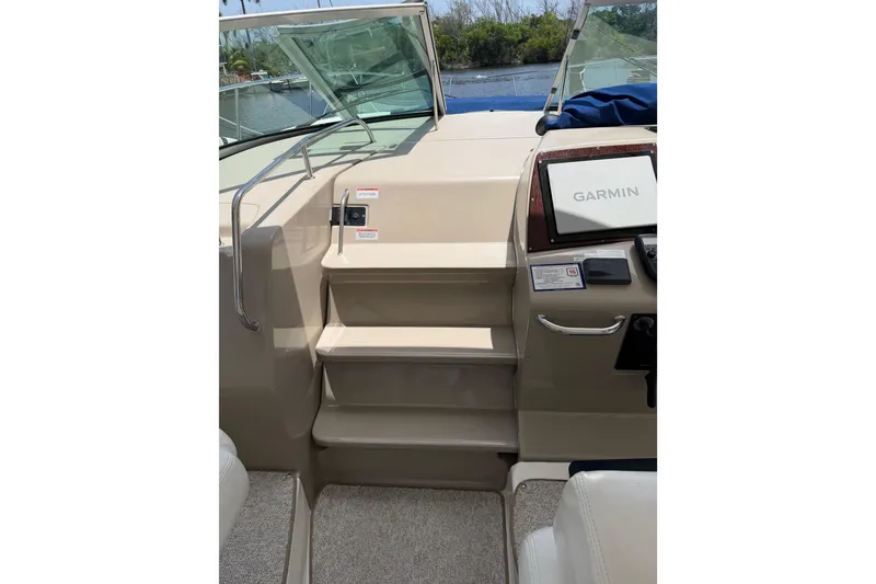 Slide: The Image of 2008 Sea Ray Sundancer 350 helm with Garmin navigation system and steps to deck. - 6