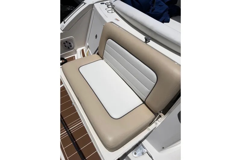 Slide: The Image of Beige and white cushioned seat on 2008 Sea Ray Sundancer 350 boat. - 40