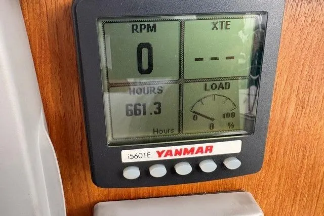 Slide: The Image of Yanmar engine display on 2013 Ranger Tugs R-29 showing 661.3 hours and zero RPM. - 43