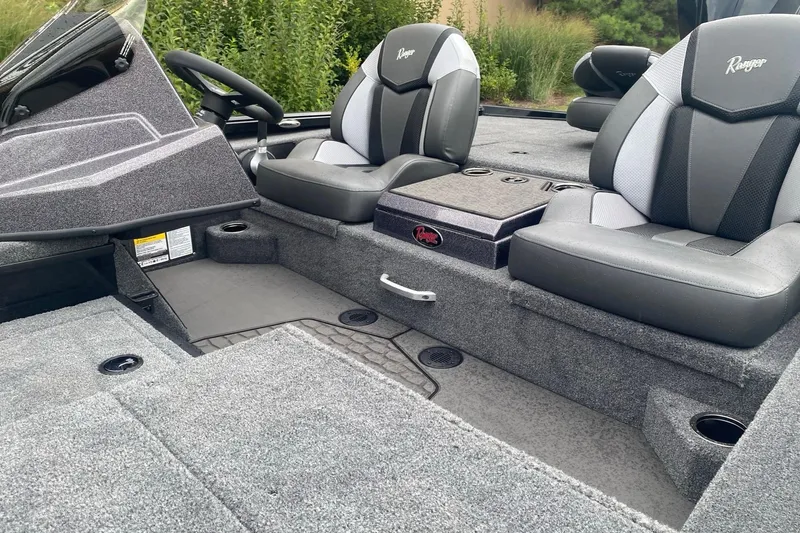 Slide: The Image of Interior of 2026 Ranger ALPHA 208 boat with gray seating and steering console. - 4