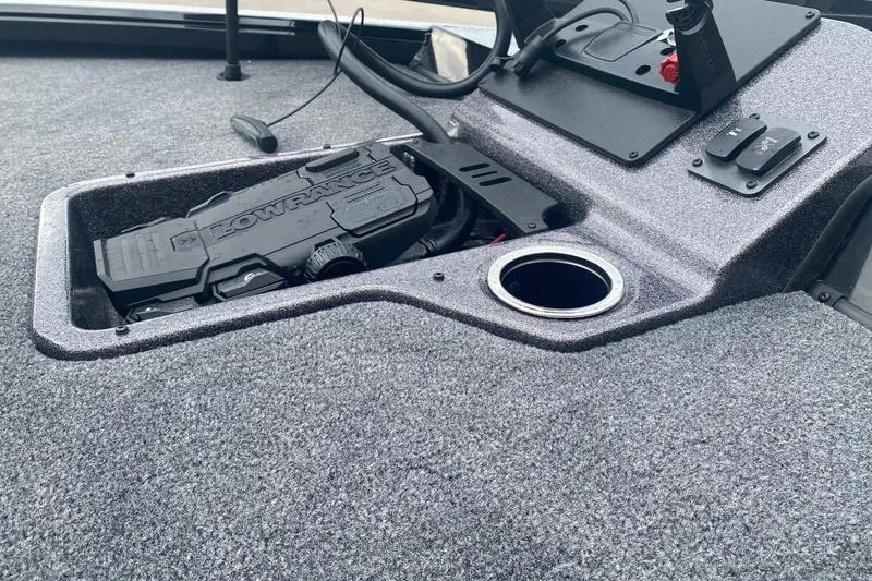 Slide: The Image of Ranger ALPHA 208 boat console with Lowrance electronics, 2026 model, featuring carpeted surface. - 7